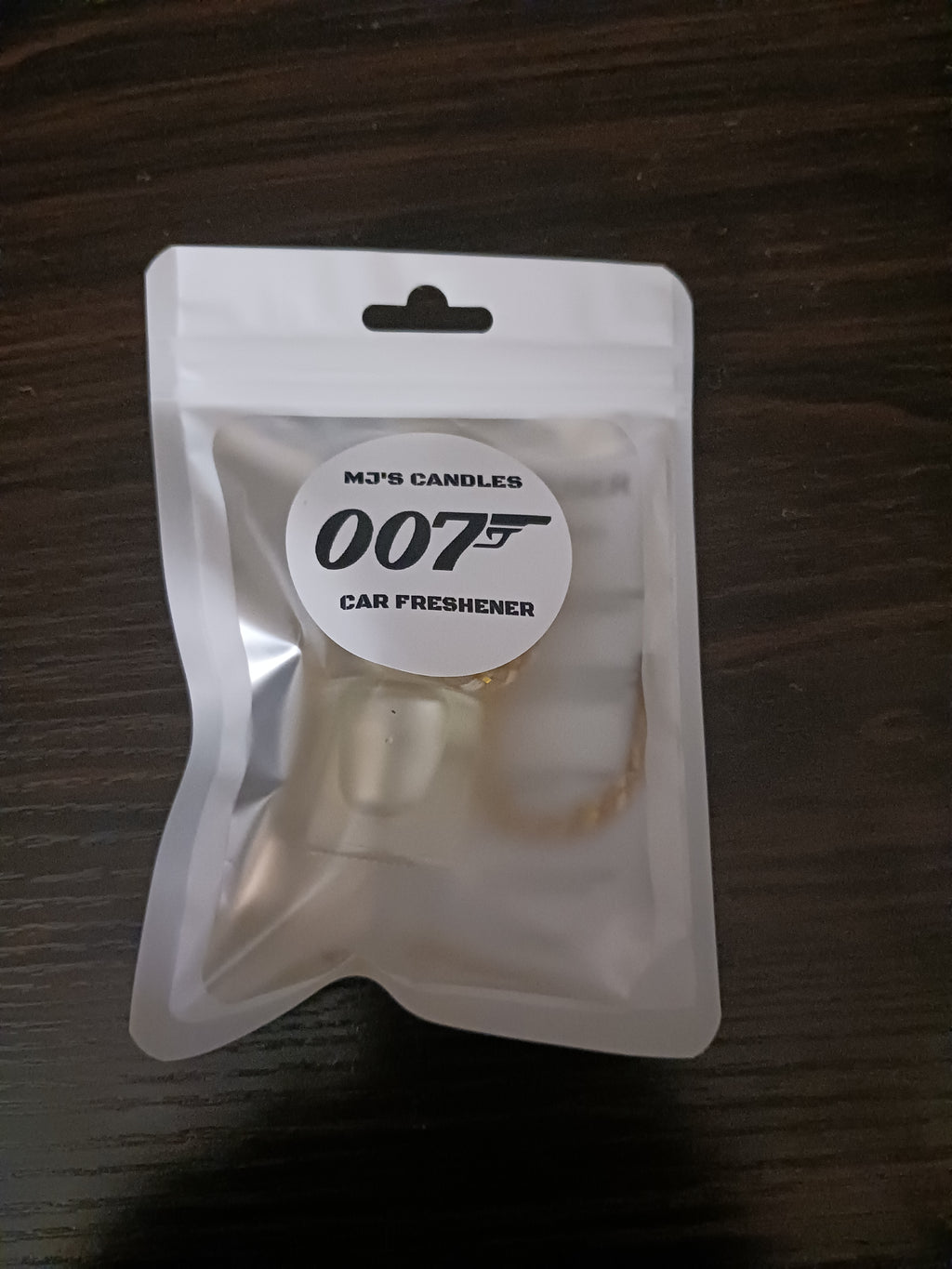 MJ'S CANDLES 007 luxury car freshener in resealable silver pouch with gold ring hook