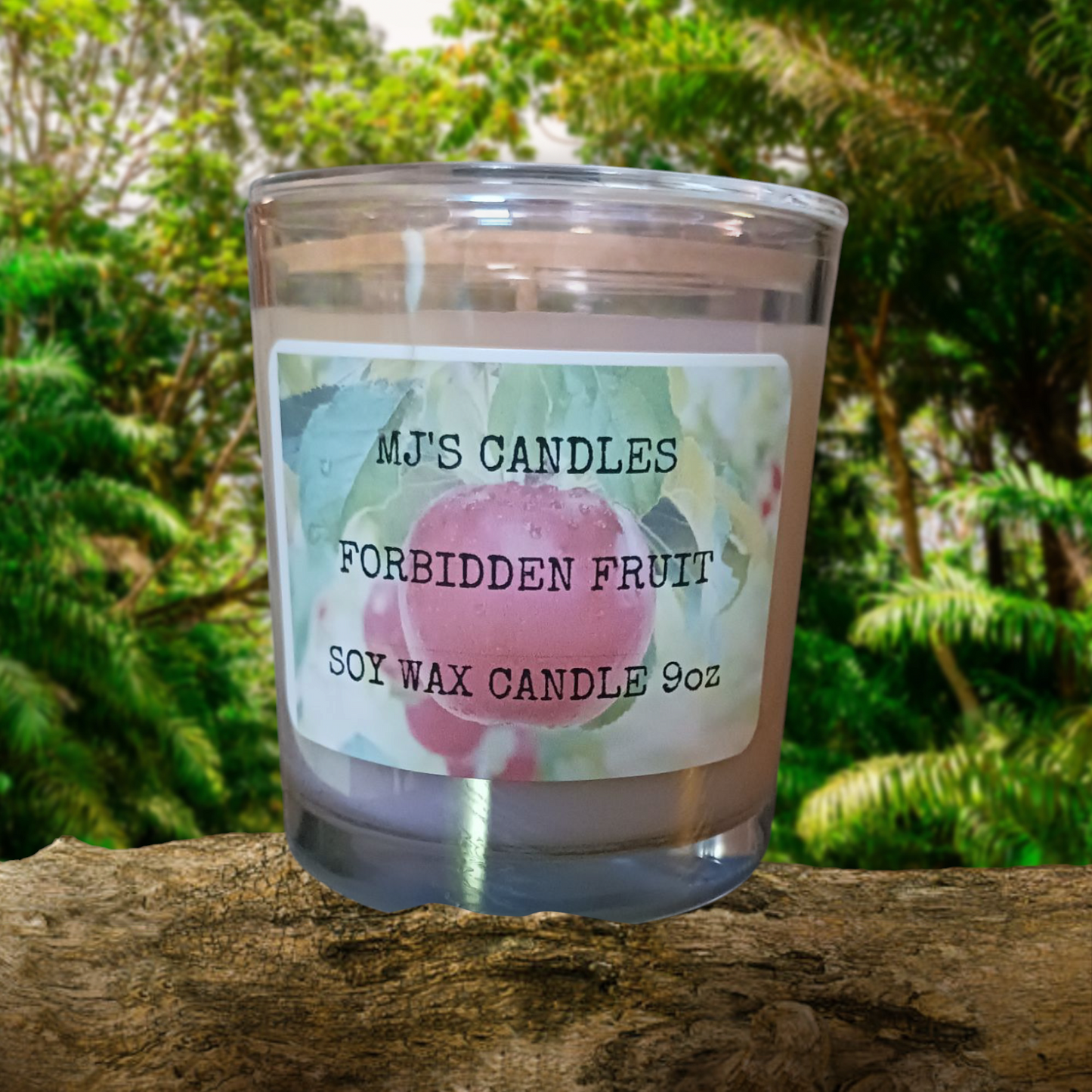 MJ'S CANDLES LLC handcrafted 10oz soy candle with Forbidden Fruit scent in clear glass jar