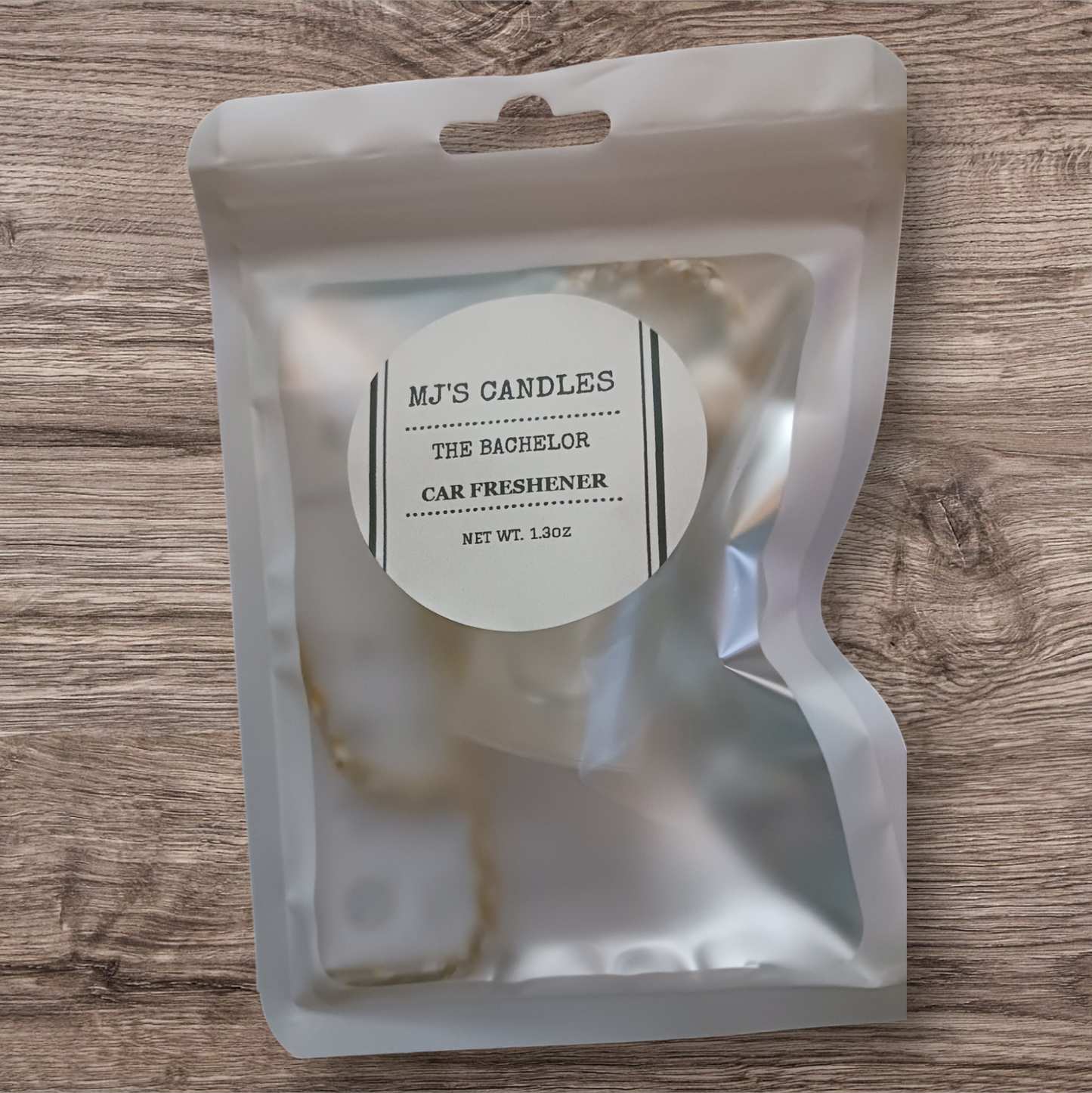 MJ'S CANDLES LLC The Bachelor luxury car fragrance for men in a resealable white pouch