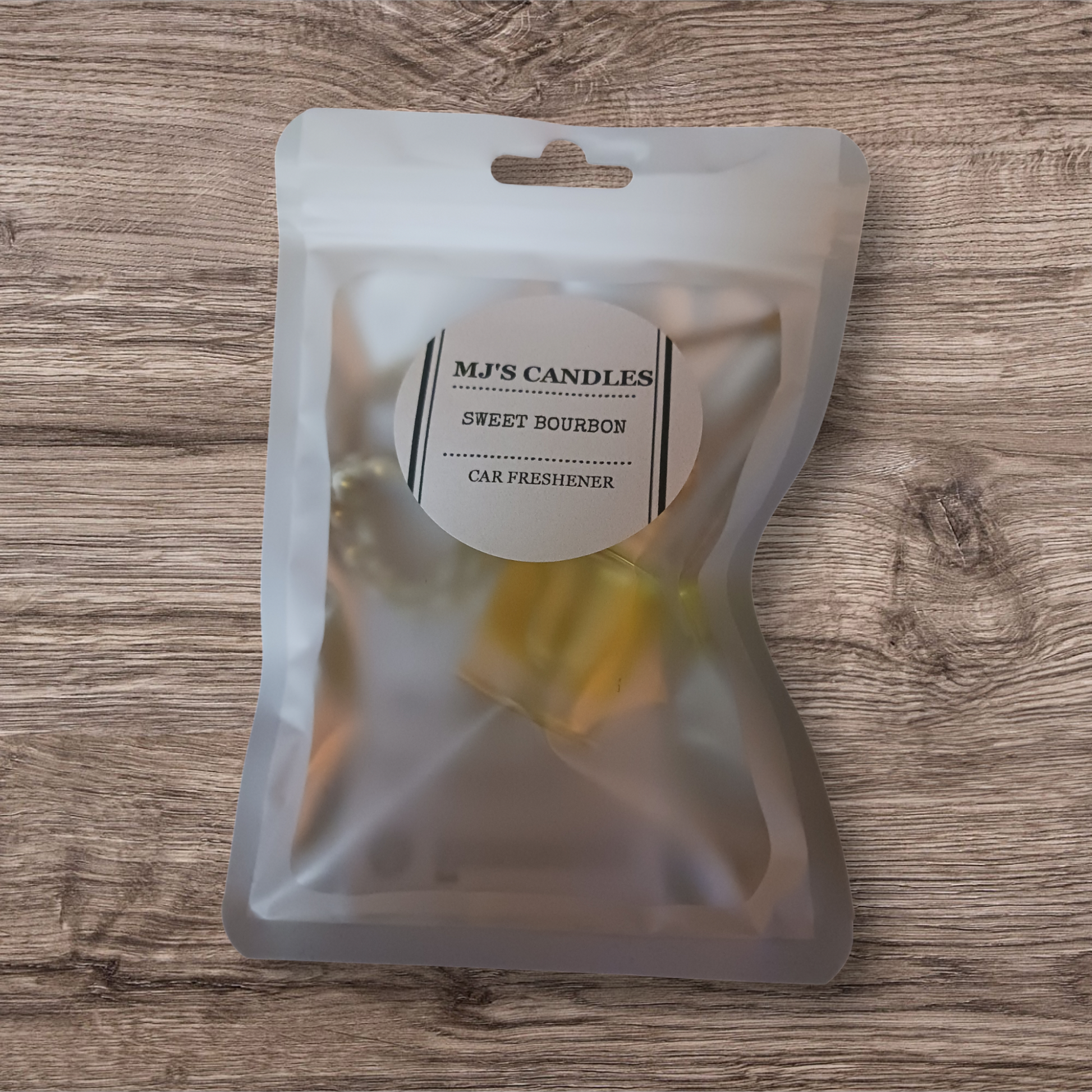 MJ'S CANDLES LLC Sweet Bourbon luxury soy car air freshener in frosted resealable pouch