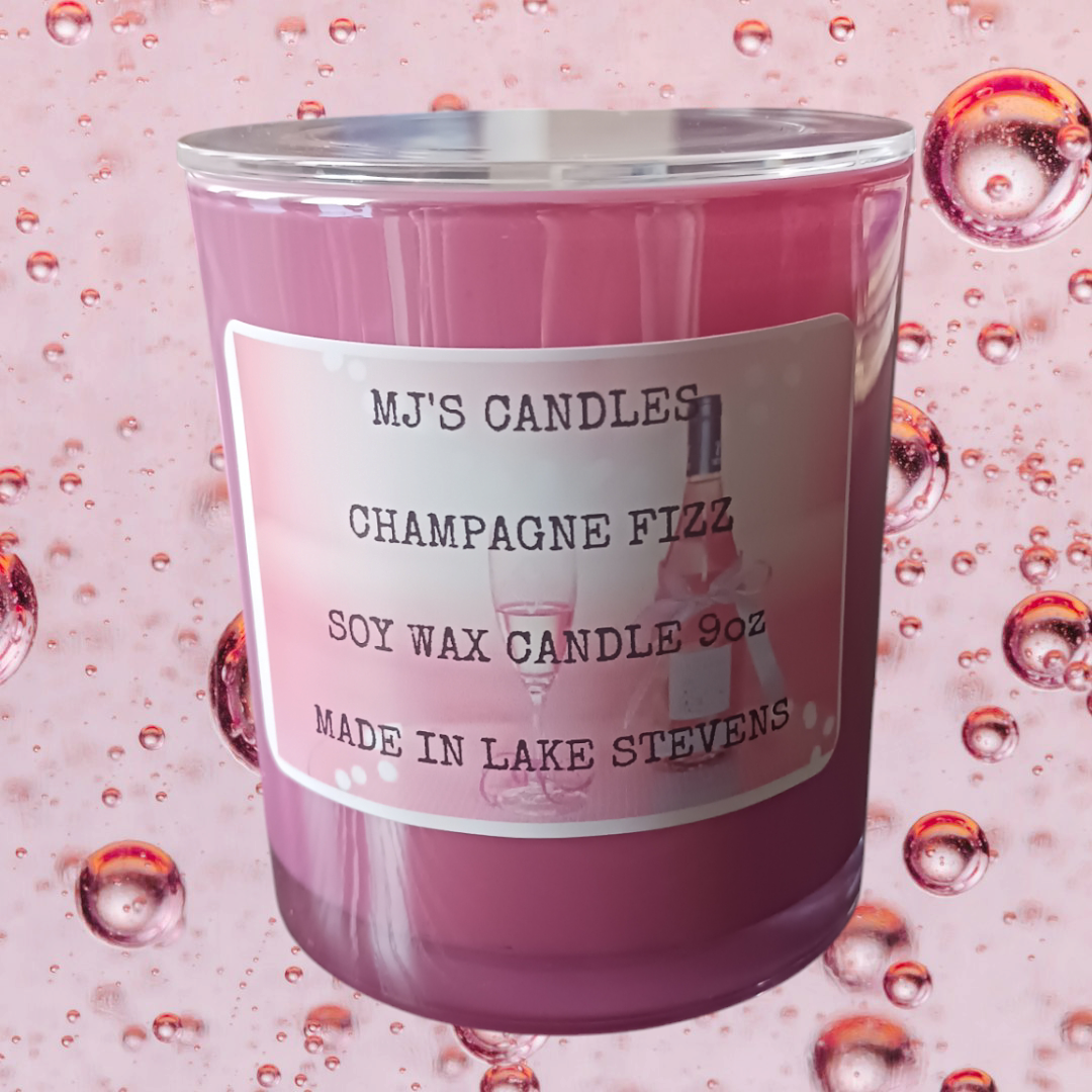 MJ'S CANDLES LLC natural champagne scented candle in pink glass jar with silver lid