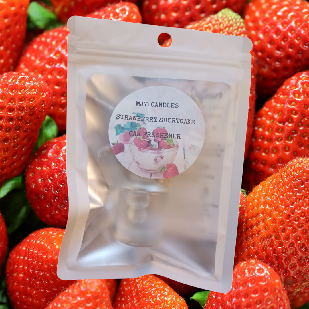 MJ'S CANDLES LLC strawberry shortcake car freshener in sealed white pouch with strawberry background