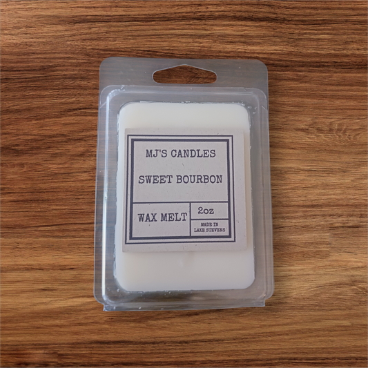 MJ'S CANDLES sweet bourbon scent luxury handcrafted wax melts in 2oz clamshell packaging on wood surface