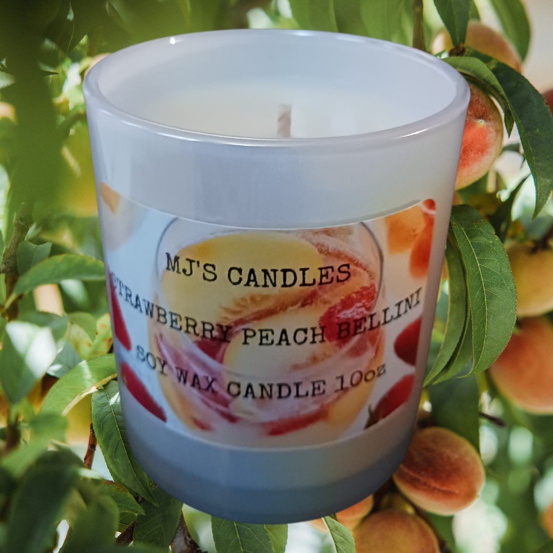 MJ'S CANDLES LLC soy wax candle with bellini peach cocktail scent in a frosted glass jar