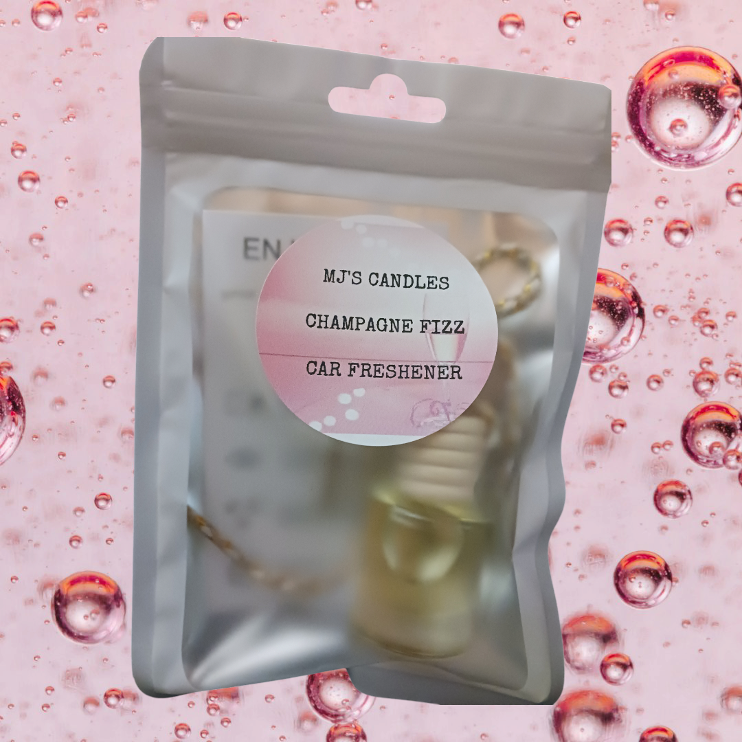 MJ'S CANDLES LLC champagne fizz scent air freshener in clear hanging pouch with gold car freshener inside