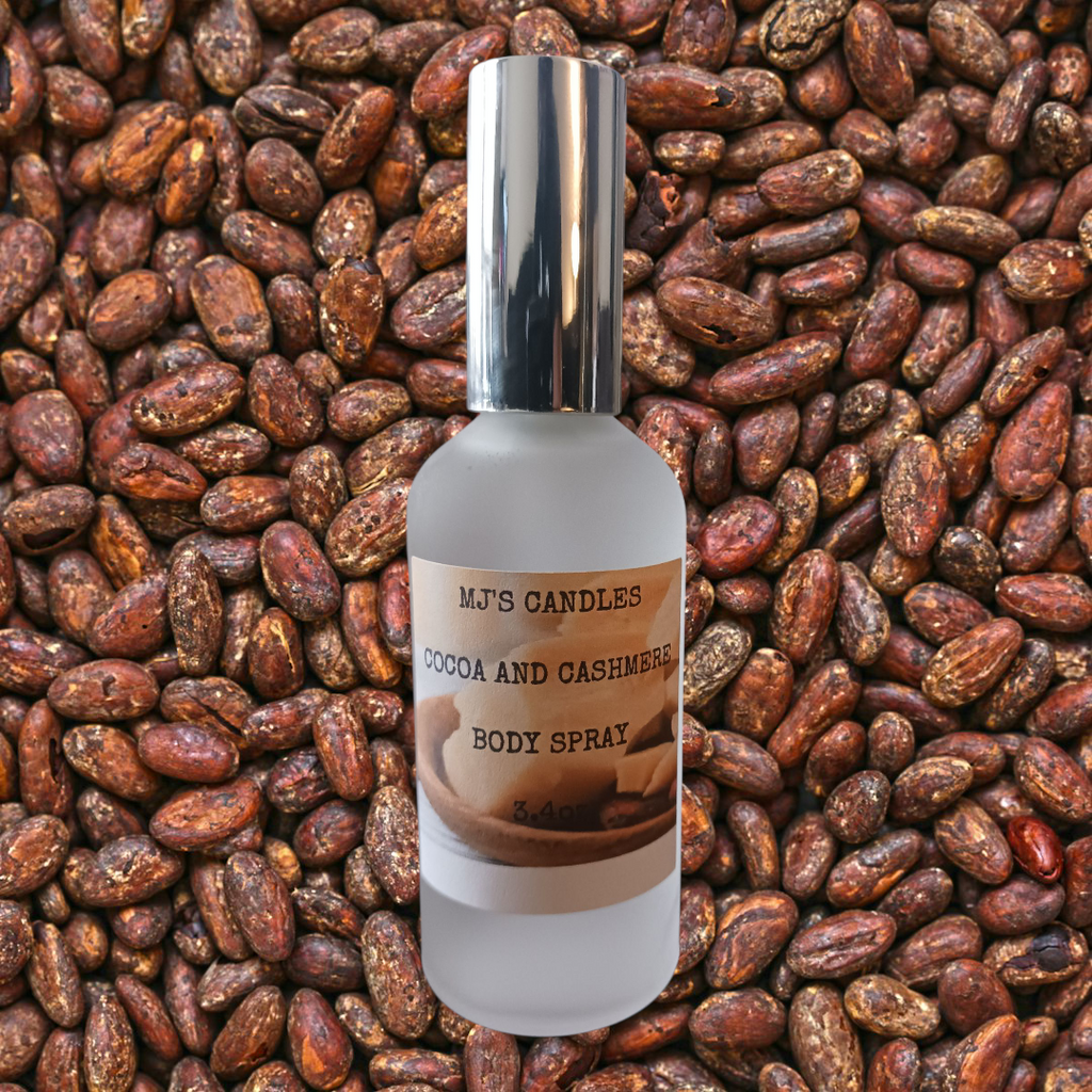 MJ'S CANDLES LLC cocoa and cashmere body spray bottle on a background of cocoa beans
