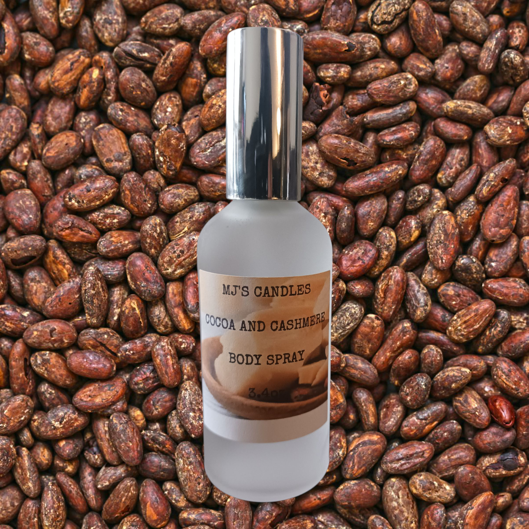 MJ'S CANDLES LLC cocoa and cashmere body spray bottle on a background of cocoa beans