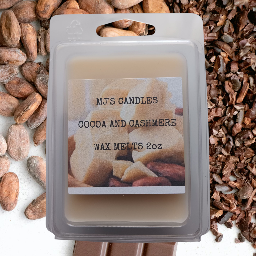 MJ'S CANDLES LLC cocoa and cashmere wax melts 2oz package on cocoa beans background