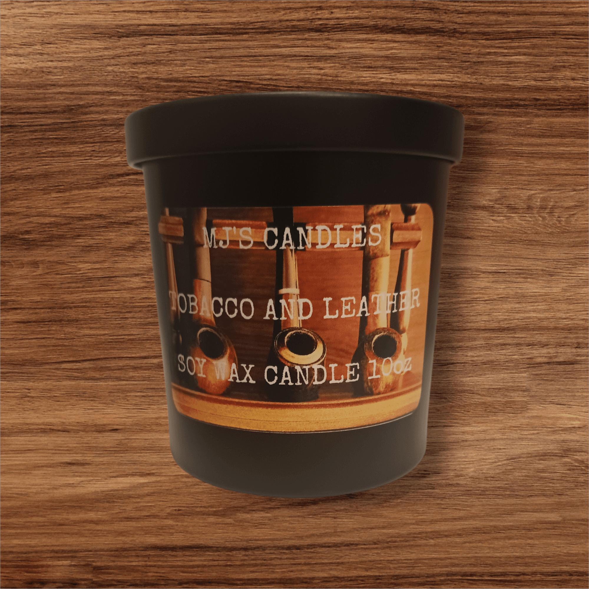 MJ'S CANDLES LLC handcrafted masculine candle scent in tobacco and leather soy wax 10oz black jar