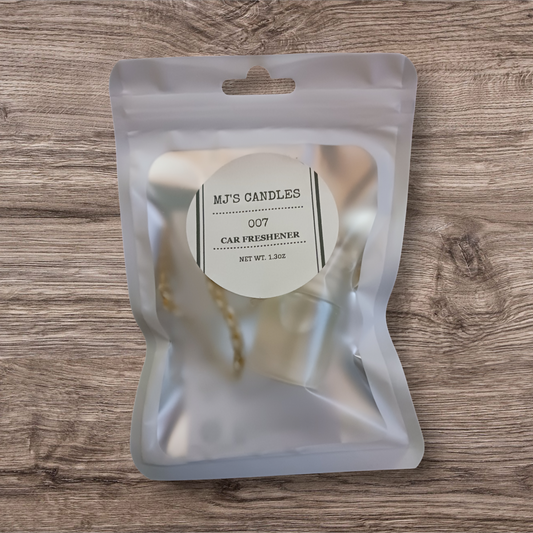 MJ'S CANDLES LLC luxury car freshener packaged in a frosted resealable pouch with label